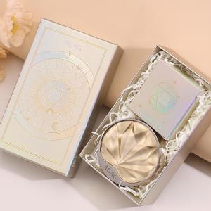 Rozjaśniający krem w poduszce z filtrem UV i efektem krycia niedoskonałości 美白防晒隐瑕气垫霜